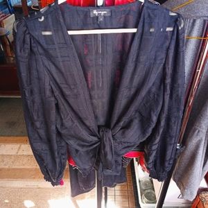 Black 'lacy' long sleeve. Option to button up shirt or you can do a loose tie